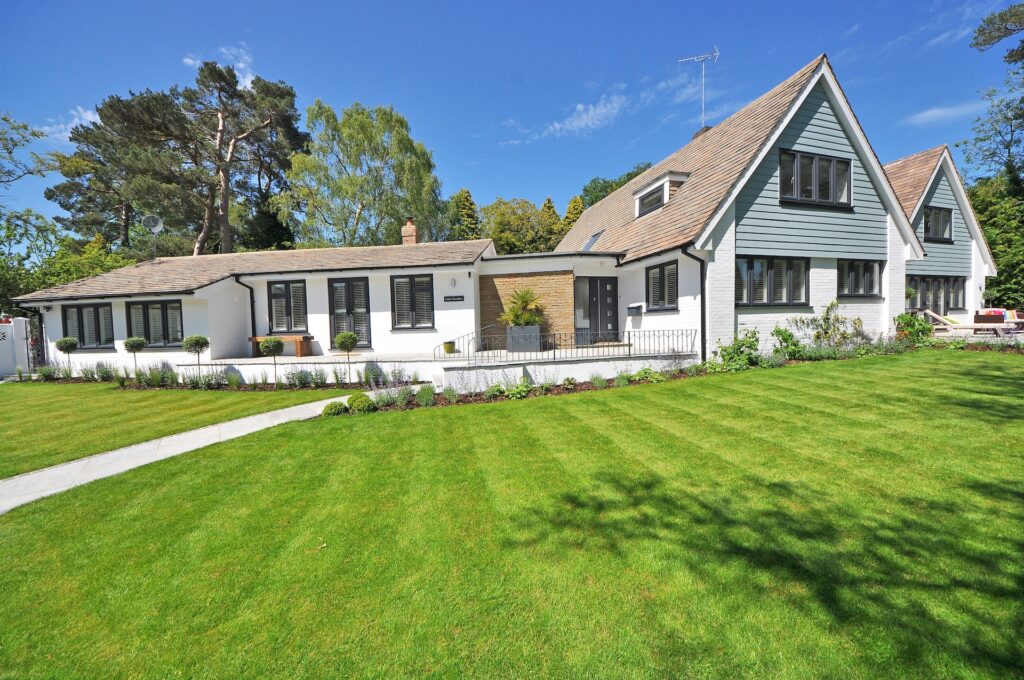 house with a freshly cut yard