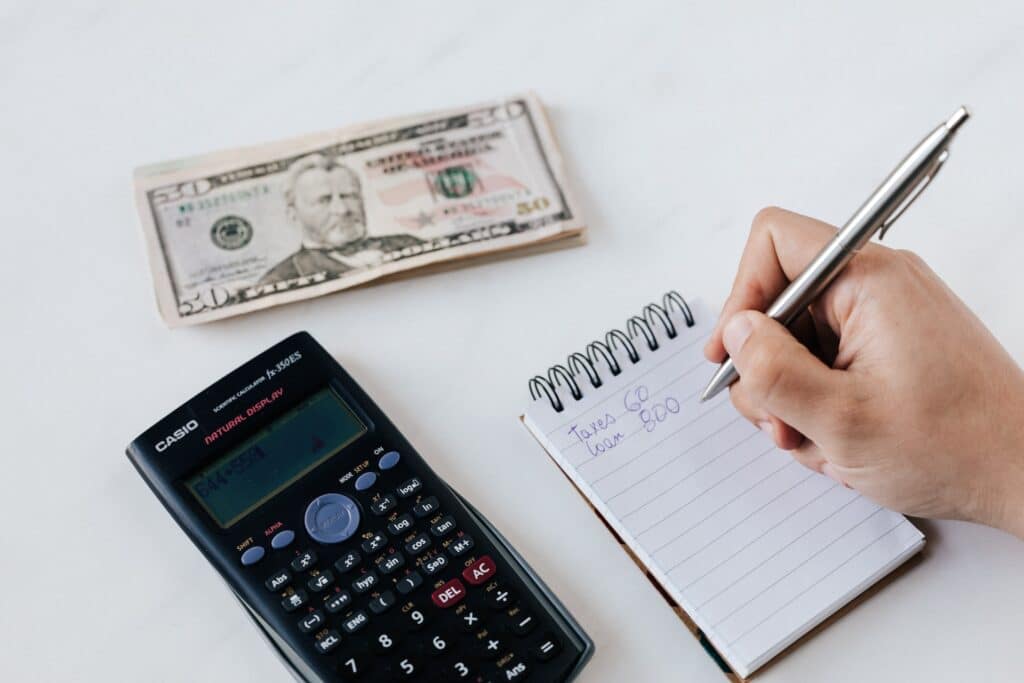 a person calculating a budget