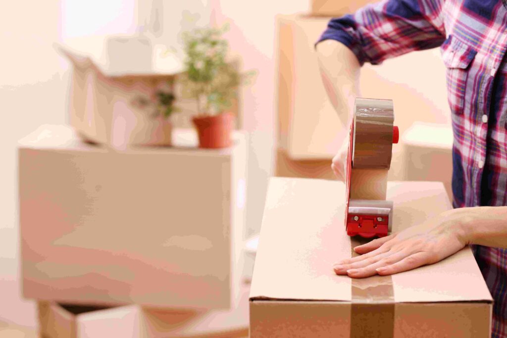 a person boxing up their stuff